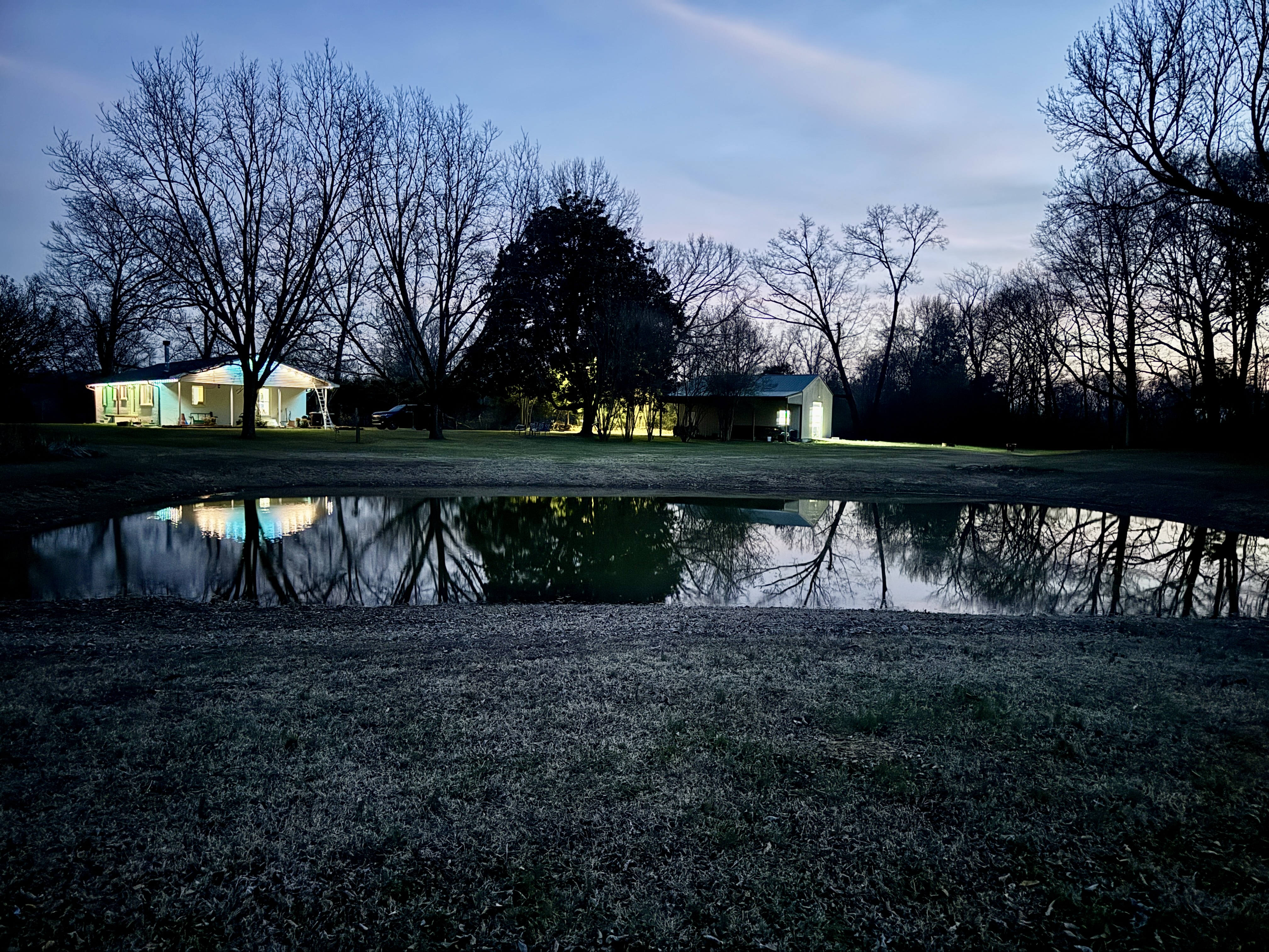 House reflecting on the pond